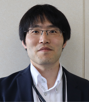運行管理システムを開発した富士通株式会社Моbiltyシステム事業本部プラットフォーム事業部の金載烈博士(環境学)